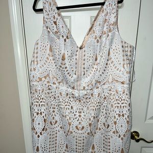 Beautiful white dress with nude lining.